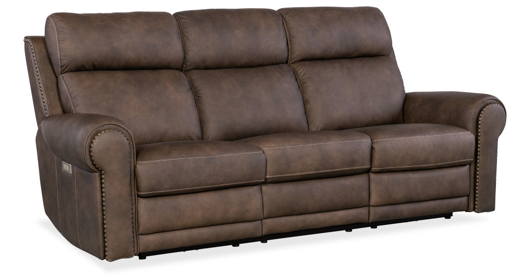 Duncan power reclining sofa with leather upholstery and headrest.
