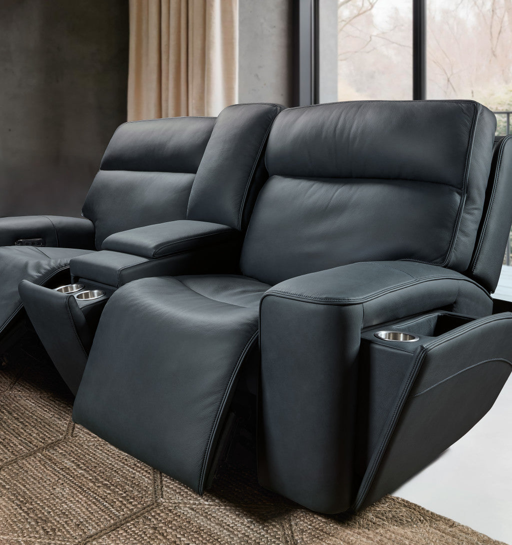 Power loveseat with adjustable headrests and built-in storage console.